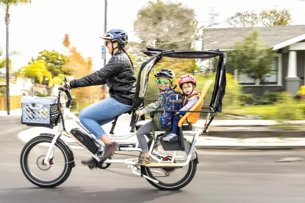 San Diego resident Stacey Mahoney rides the RadWagon E-Bike with her family.