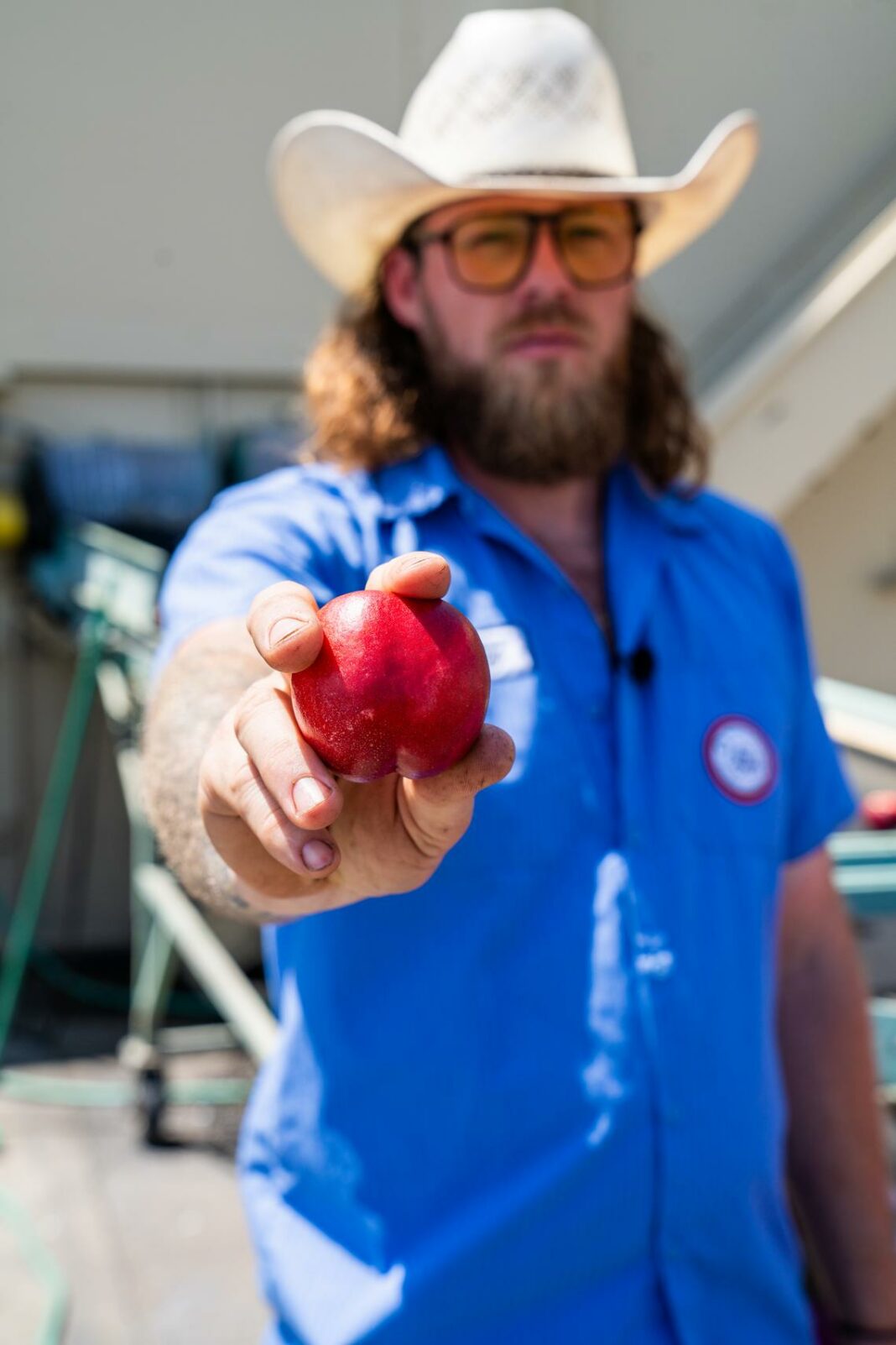ben moore holding an apple